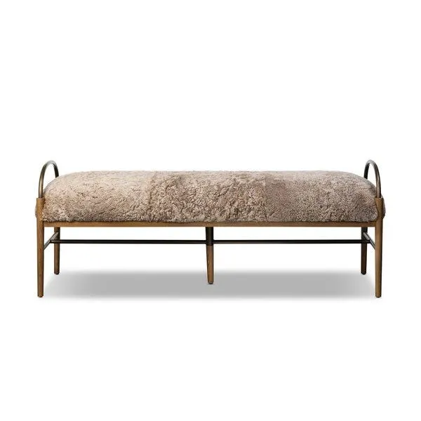 Demi Accent Bench with curved brushed iron arms, amber ash legs, and a cream shearling cushioned seat