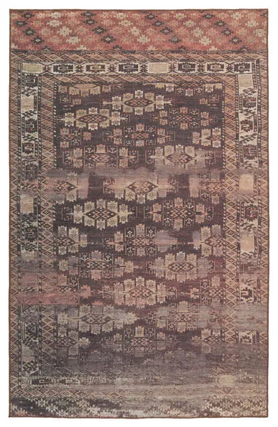 Southwestern tribal area rug with distressed terracotta, dark brown, beige, plum, and orange trellis pattern