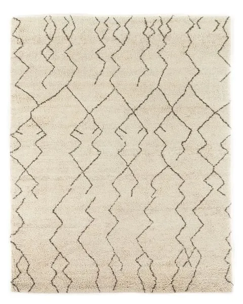Cream Moroccan hand-knotted rug with dark geometric zigzag lines, plush texture
