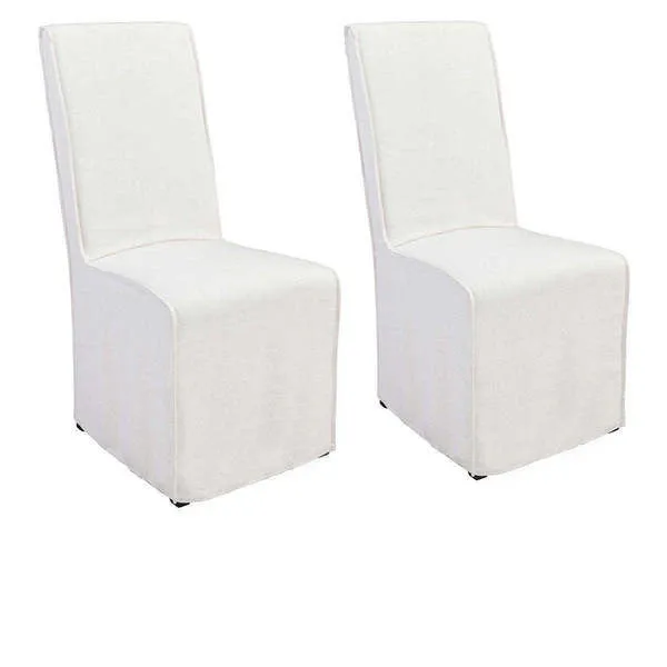 Set of two Jordan upholstered dining chairs with white linen blend slipcovers on birch wood frames