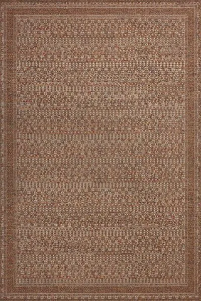 Merrick Natural Fiesta Rug with warm rust palette and intricate woven pattern in 100% polypropylene
