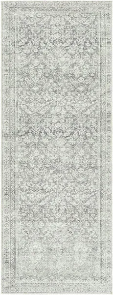 Charcoal machine woven rug with intricate vintage floral pattern in subdued gray tones