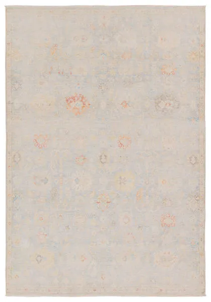 Traditional Doire area rug with faded pastel Oushak pattern in light blue and cream with hints of orange and yellow