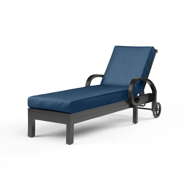 Monterey Chaise Lounge with dark espresso metal frame and deep blue cushion on adjustable backrest with curled arm detail