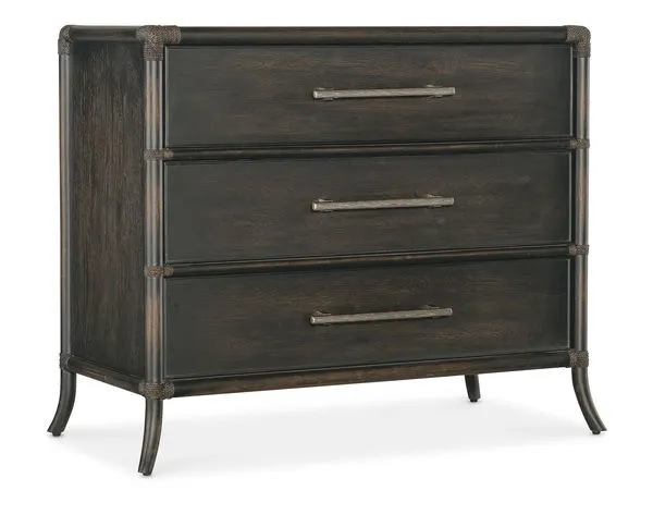 Retreat Pole Rattan Chest with three black sand finish drawers, seagrass green drawer fronts, and pewter textured bar pulls