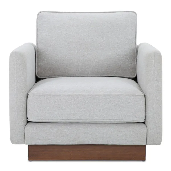 Vernon accent chair in light gray fabric with removable cushions and wooden plinth base