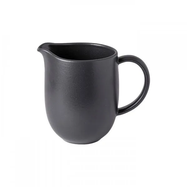Seed grey fine stoneware pitcher with rounded body, curved spout, and looped handle