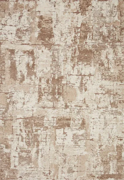 Top-down view of the Theory beige taupe rug highlighting its full abstract design and color variation