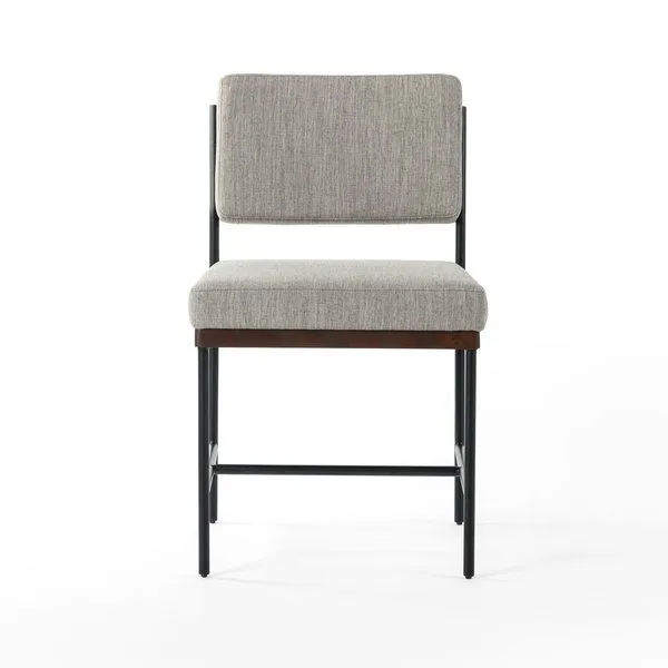 Chair shown from front on a white background highlighting clean lines and subdued color palette