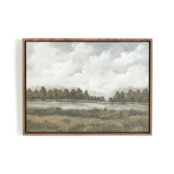 Landscape painting of a calm water body with dense trees lining the horizon under a cloudy sky in earthy tones, framed in ...