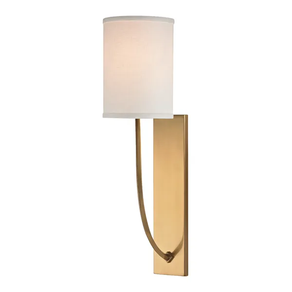 Colton 1 Light Wall Sconce with tall brass backplate and curved arm holding a white fabric drum shade