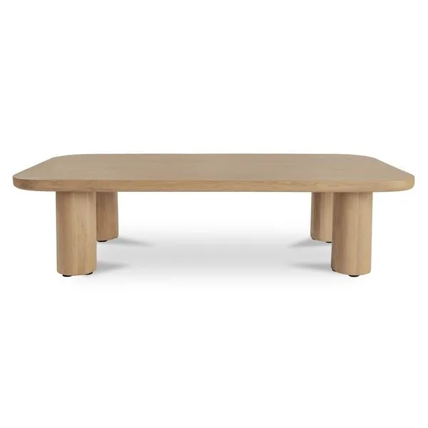 Full profile view of Anders coffee table showing all four cylindrical legs and smooth surface