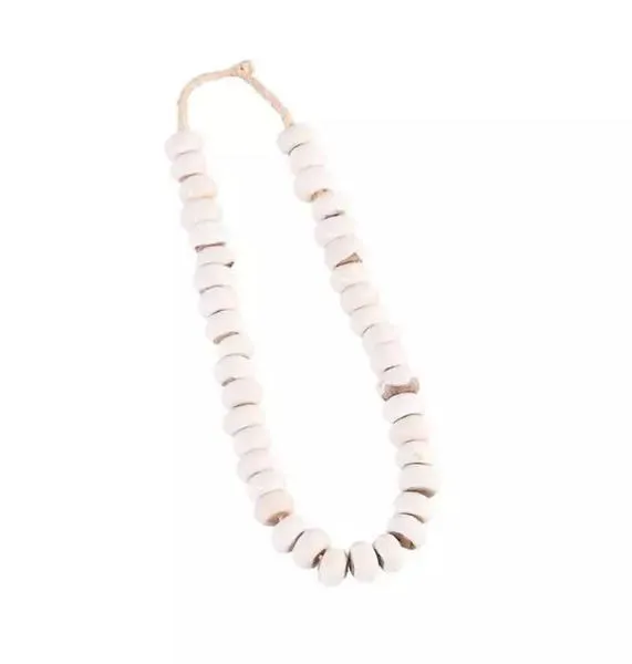 Kenya Cow Bone Drum Beads necklace with white, rounded beads strung on natural twine