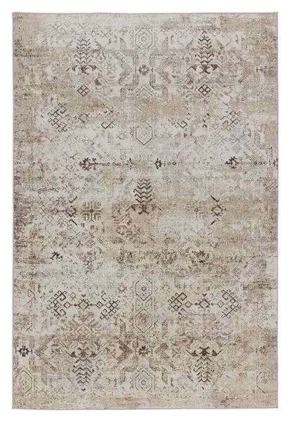 Kati Tribal area rug in brown and cream with an intricate distressed tribal pattern on a soft, low-pile surface