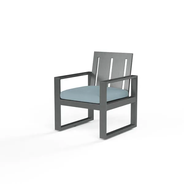 Redondo Dining Chair with powder coated aluminum frame, hand-brushed slate finish, wide slat back and blue seat cushion
