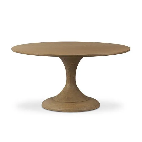 Round Eastman dining table in light weathered oak veneer with tulip pedestal base and step detailing.