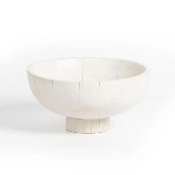 Ivory turned pedestal bowl with a wide shallow profile and cylindrical foot base