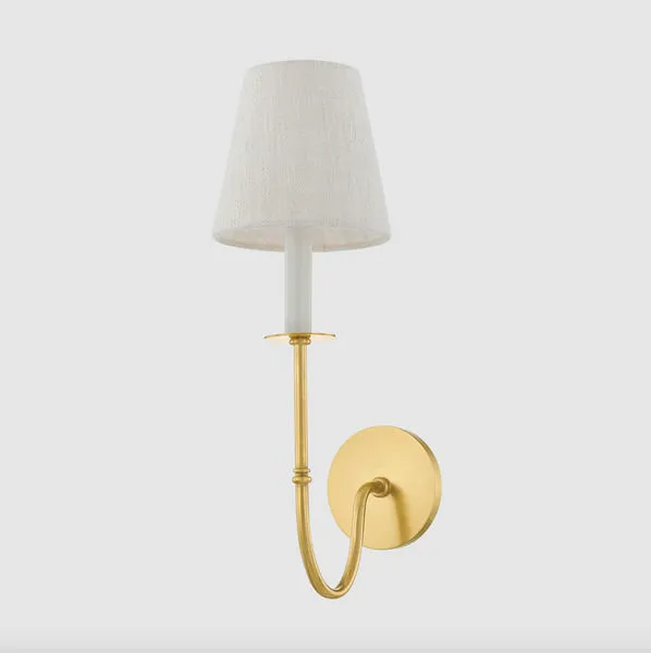 Amina Wall Sconce showing angled side view with clear linen texture on shade