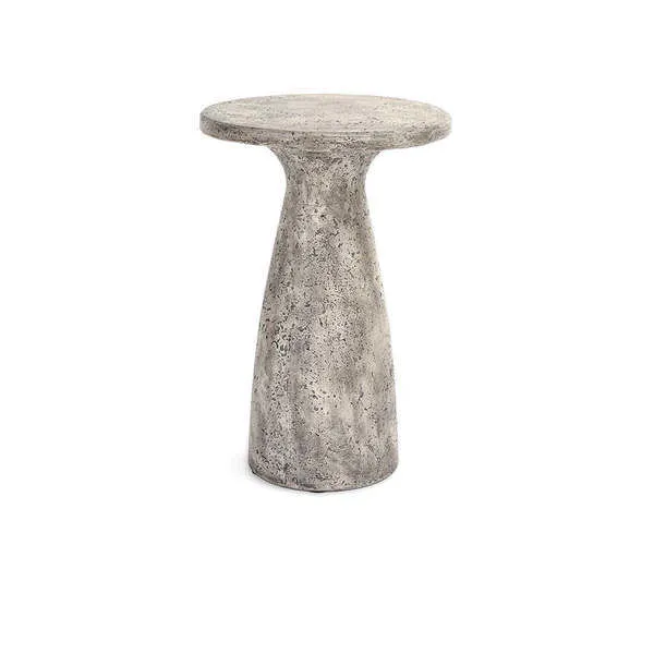 Light gray concrete outdoor accent table with a rounded top and curved base featuring textured surface