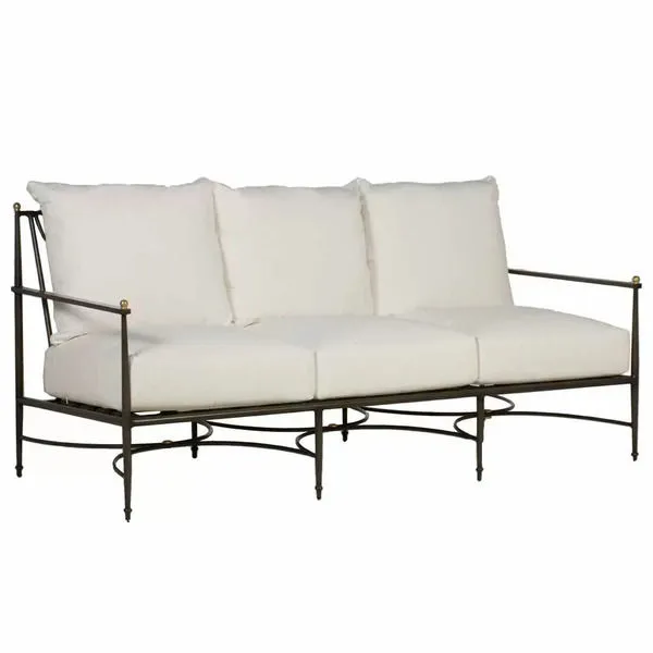 Roma Slate Gray Aluminum Sofa with three white cushions and black metal frame accented with brass detailing