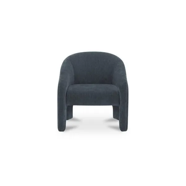 Tuva Accent Chair in slate-blue velvet with sculptural curves, high back, and plush cushioning