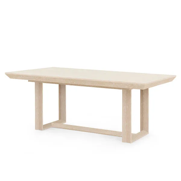 Angled side view highlighting the rectangular tabletop and open rectangular leg frame of the Finn Dining Table