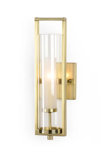 Lancaster Sconce in antique brass with rectangular metal frame and clear and frosted cylindrical glass covering electrifie...