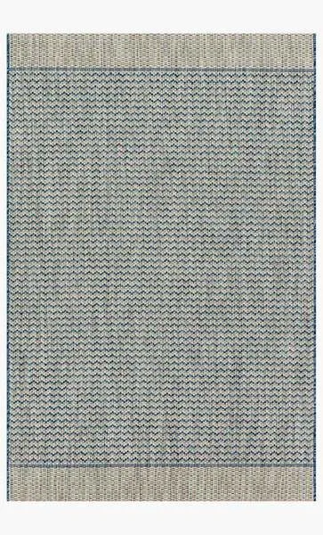 Rectangular indoor/outdoor rug in grey and blue with woven zigzag pattern and bordered edges