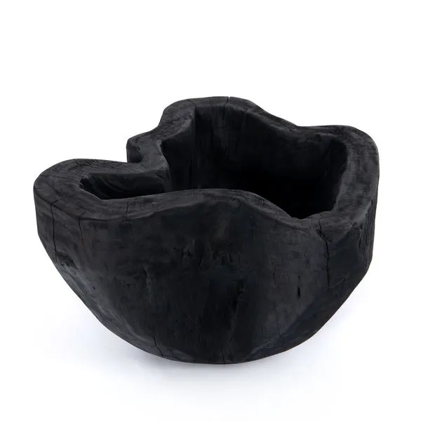 Hand-shaped live edge bowl in carbonized black reclaimed mixed wood with organic cracks and splits