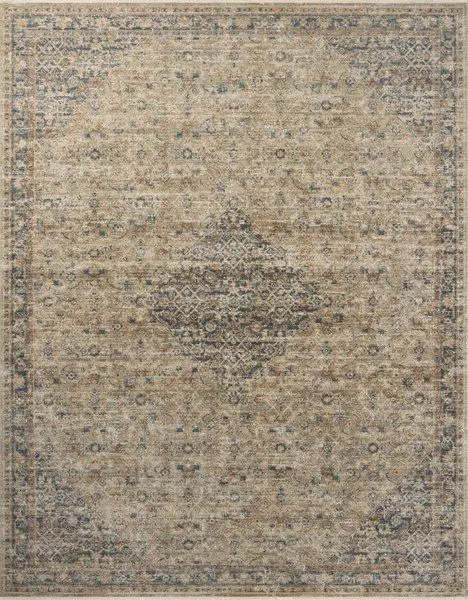Traditional Heritage Sage Navy rug with vintage-inspired motifs and variable-pile texture in muted beige and blue tones