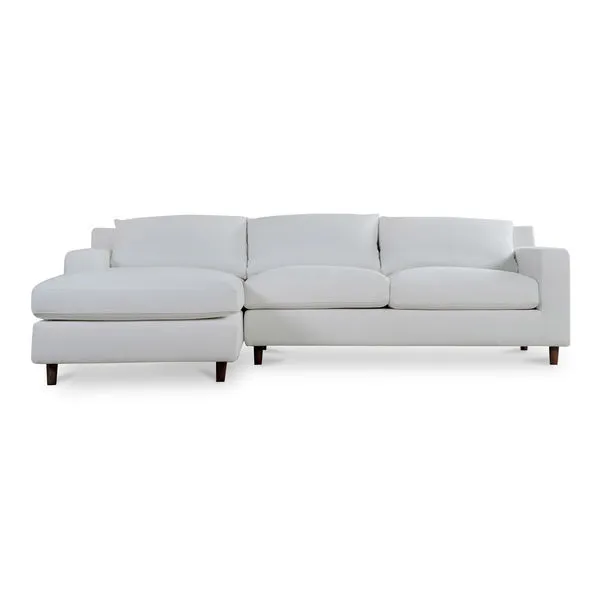 Off-white Hutton sectional sofa with plush cushions, higher back, and tapered dark wood legs in chenille fabric