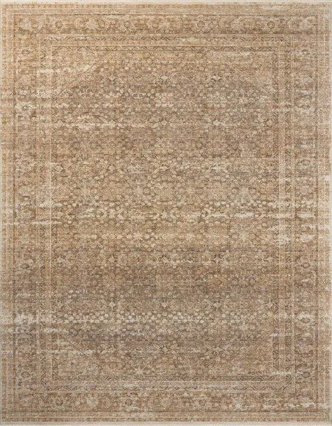 Heritage Clay Natural Rug with vintage-inspired motifs in warm beige and brown tones and a variable-pile texture