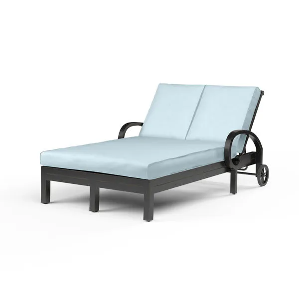 Monterey Double Chaise with espresso aluminum frame, curled arms, cross back detail, and light blue cushions for two