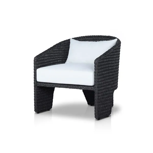 Three-leg outdoor accent chair with black all-weather wicker barrel back and white olefin cushions