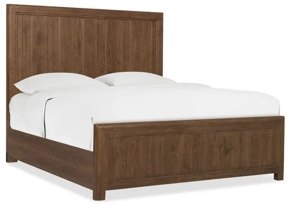 Driftwood King Panel Bed in worn saddle finish with tall paneled headboard and matching footboard