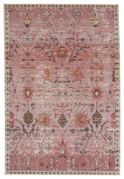 Oriental pink rug with faded lilac, gold, and brown floral patterns inspired by traditional Turkish textiles