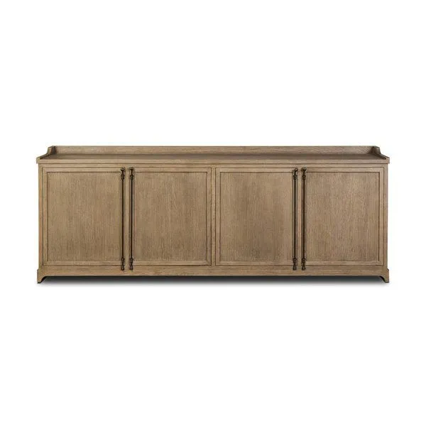 Adela Sideboard with four panel doors, aged bronze hardware, weathered washed oak finish, and gallery top design