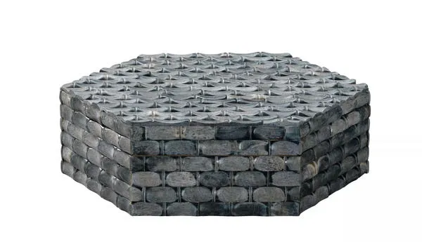 Hexagonal alabaster storage box with natural grey finish and detailed carved pattern on top and sides.