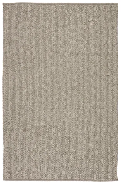 Light gray indoor outdoor area rug with bold handwoven texture in a vertical pattern