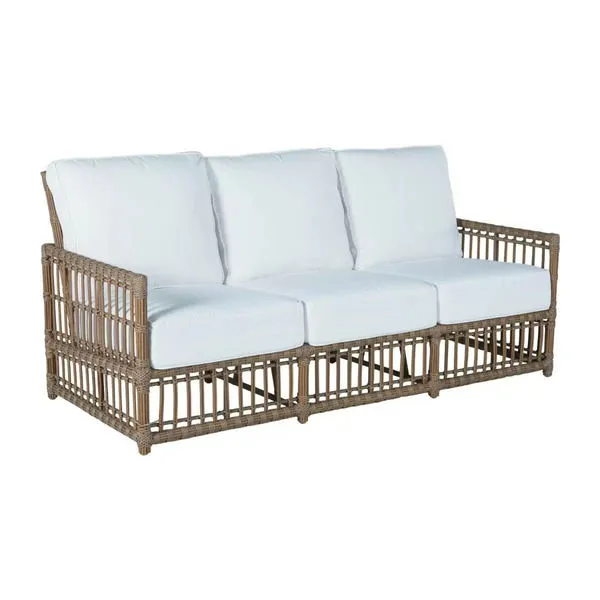 Newport Burlap Woven Sofa with light brown woven rattan frame and white seat and back cushions