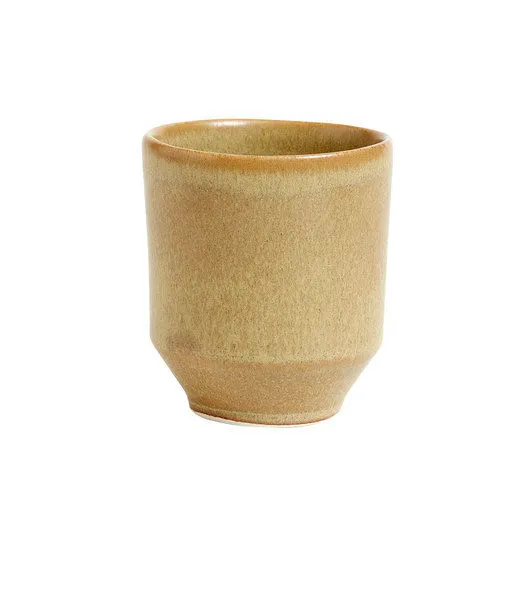Scandinavian ceramic water glass with a tapered base and warm beige glaze with natural texture