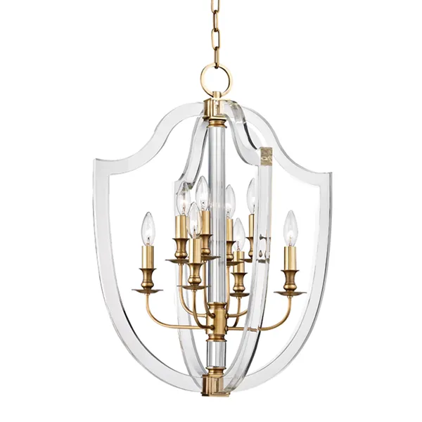 Arietta 8 Light Pendant with eight candle-style lights in a clear curved acrylic frame and brass accents, modern design