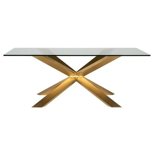 Couture Dining Table front view showing symmetrical gold base structure and clear glass top