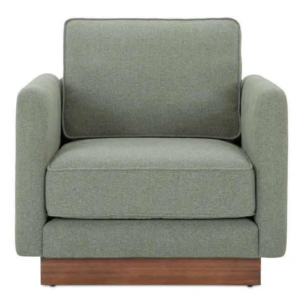 Vernon Accent Chair in muted green fabric with removable cushions and wooden plinth base in mid-century modern style
