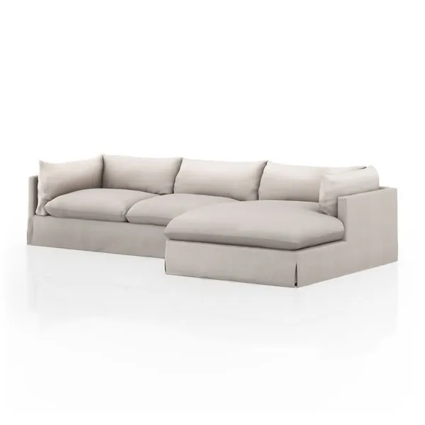 Right arm-facing Habitat 2 Piece 133-inch sectional with neutral slipcovered fabric and pillow-inspired cushions