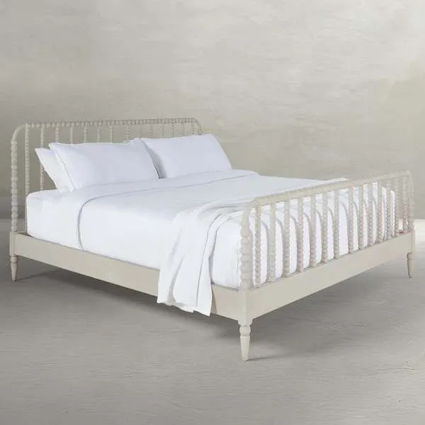 Jennifer Queen Bed in distressed antique white with spindle headboard and footboard on tapered legs