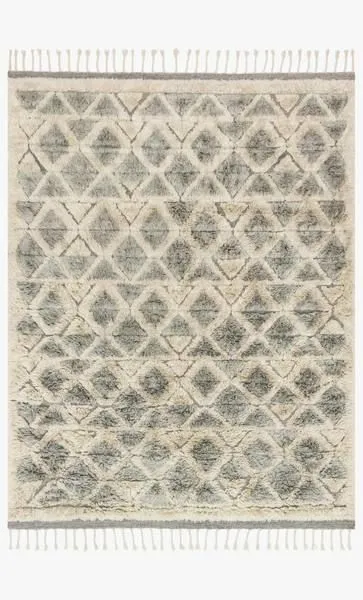 Taupe and smoke shag rug with geometric diamond patterns and fringed edges, soft texture