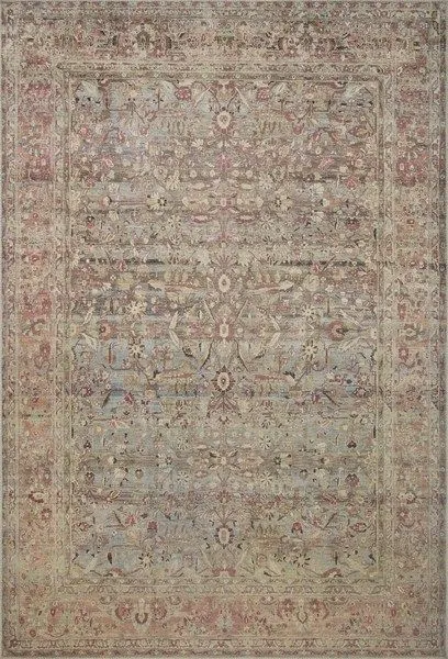 Adrian Ocean / Clay Rug with vintage-inspired floral pattern in warm muted blues, reds, and beige tones