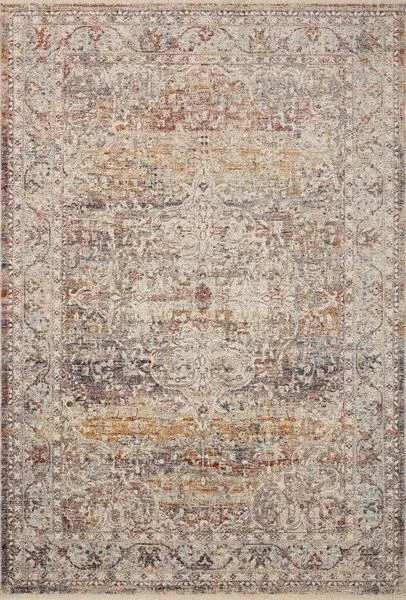 Sorrento natural multi round rug with faded vintage ornate pattern in warm beige, rust, gold, and blue tones
