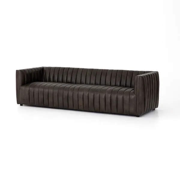 Deep brown top grain leather sofa with bold vertical channeling and a modern boxy silhouette